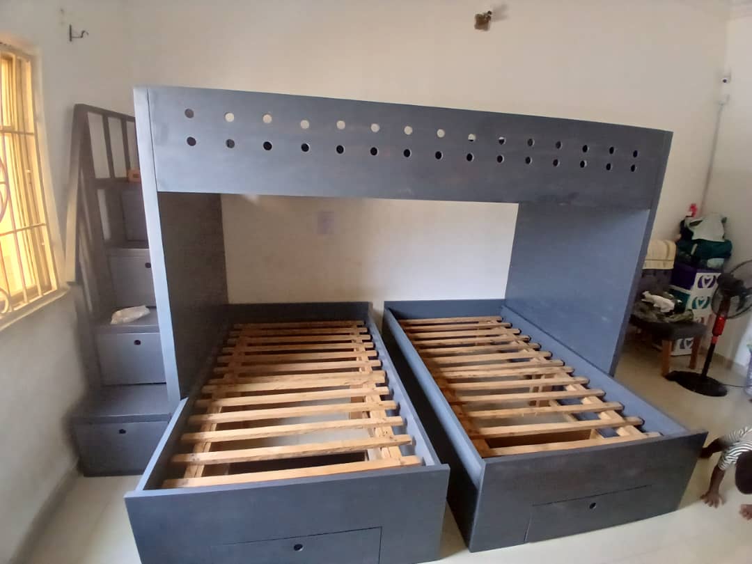 A double bunk bed, a wondrous sight
Two tiers of rest, in morning light
A cozy nest, for dreams to roam
A space-saving gem, for a busy home
The bottom bunk, a snug retreat
A hidden world, where secrets meet
The top bunk, a thrilling height
A adventure zone, where stars shine.