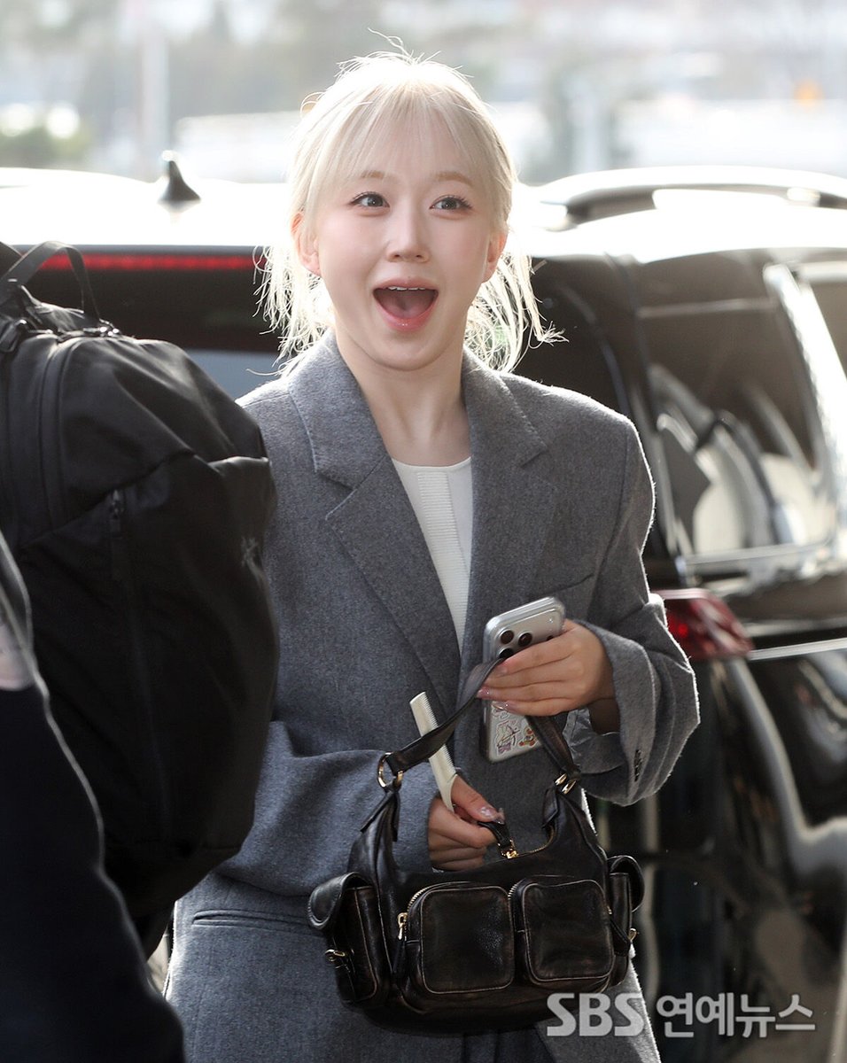 NMIXX's HAEWON Flashes a Bright Smile En Route to Tokyo 👉 Read