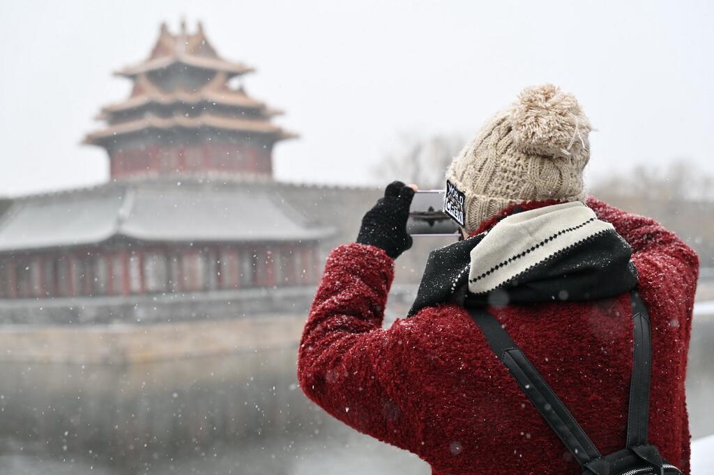 PDChinese's tweet photo. 【瑞雪降京城】12月12日，北京迎來2025年冬首場明顯降雪。 https://t.co/qyYzpekUSF