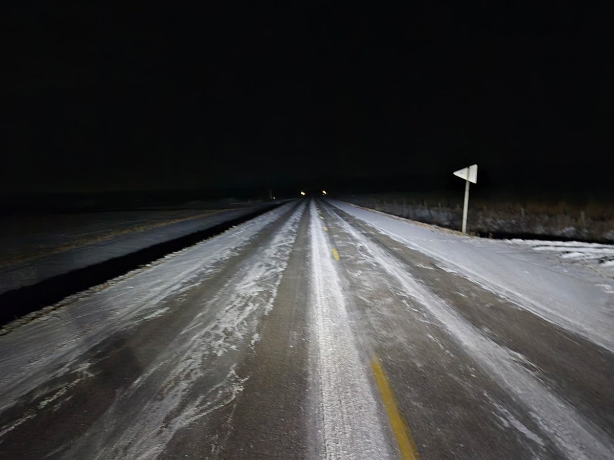 Roads in the south half of the county are completely covered with snow and ice. In the north half, the roads are partially to completely covered with snow. Trucks are heading out on the paved roads this morning. If you're out early this morning, slow down and take your time.
