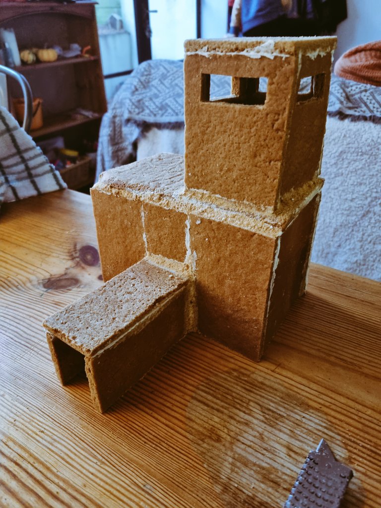 A morning of gingerbread architecture for us. A spy house complete with escape tunnel and lookout tower for my son, and a cute little house with a rather elaborate porch for the daughter.

Next up, decorations.

#festive #creativity #gingerbreadhouse