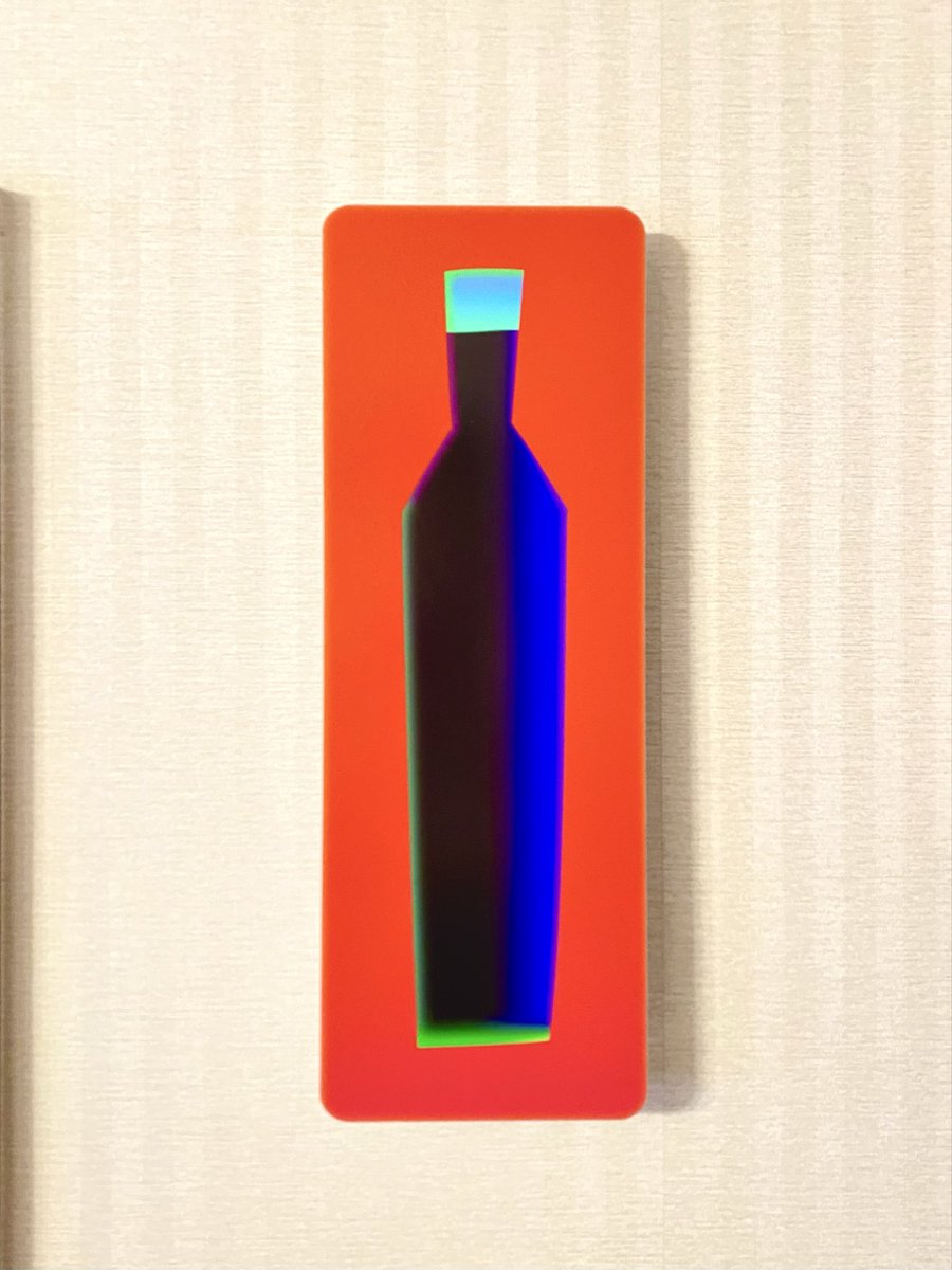 めちゃイカしたボトルの絵を買った。帰宅即壁にかけて眺めながらお酒