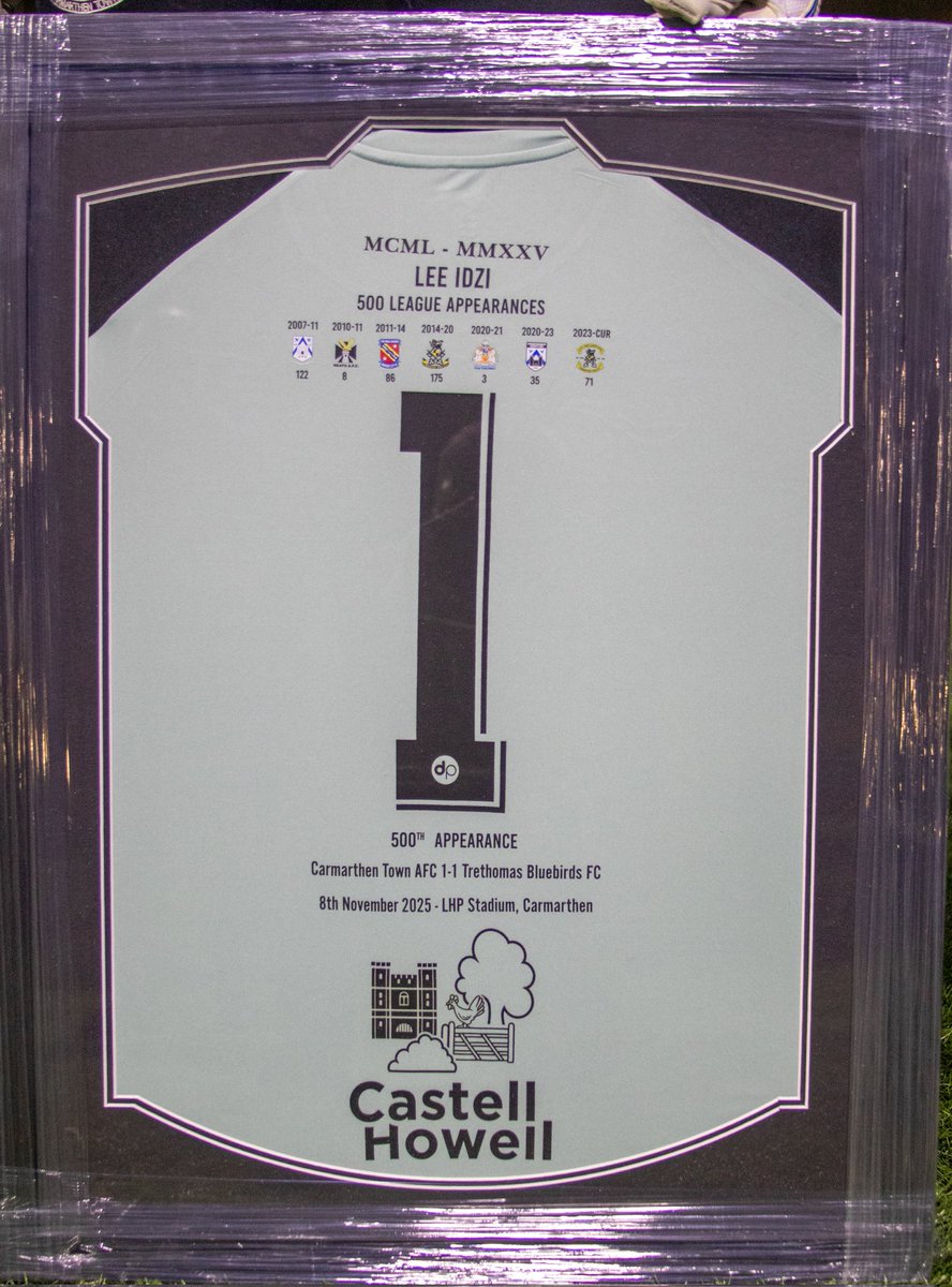 CarmarthenAFC's tweet image. Before our game on Friday we presented Lee Idzi with a match shirt to commemorate his 500th League Appearance. The presentation was made by First Team Manager Mark Aizlewood and Carmarthen Town kitman Mark Hannington to Lee and his family 

Llongyfarchiadau Lee
