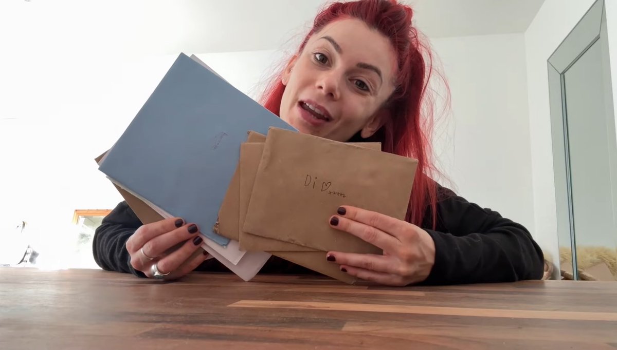 now right I knew I had small writing, but I never really realised it was THAT small!!! (the blue card is one of mine😭)