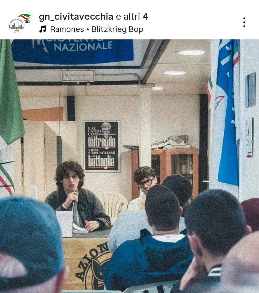 AlekosPrete's tweet image. Nella sede di FdI a Civitavecchia, durante un’iniziativa di Gioventù Nazionale e Azione Studentesca, è esposto un manifesto con i versi di Laude dell’Eroismo Ardito, canzone di area neofascista ben nota negli ambienti dell’estrema destra. #matrice