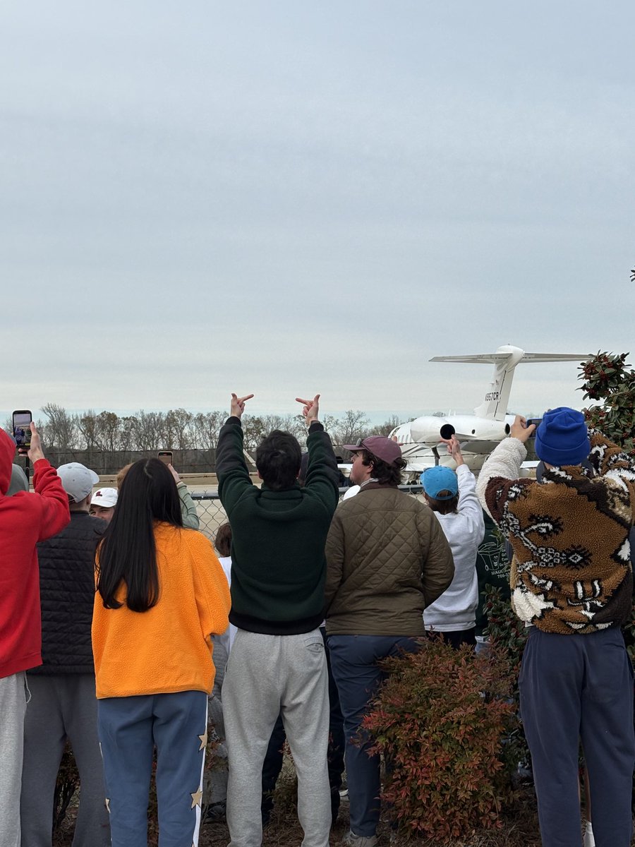 JTalty's tweet image. As the first members of the Kiffin contingent, including brother Chris, board the plane, Ole Miss fans at Oxford Airport loudly boo the departing group.