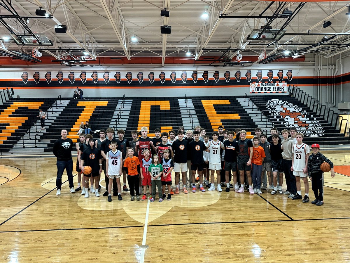 East Boys proudly accepted STC STORM’s basketball donation at Orange and Black Night. We loved seeing so many players in the stands supporting our Saints! <a href="/STCE_bball/">STCE Boys Basketball</a> <a href="/StCharlesEast/">St. Charles East HS</a>