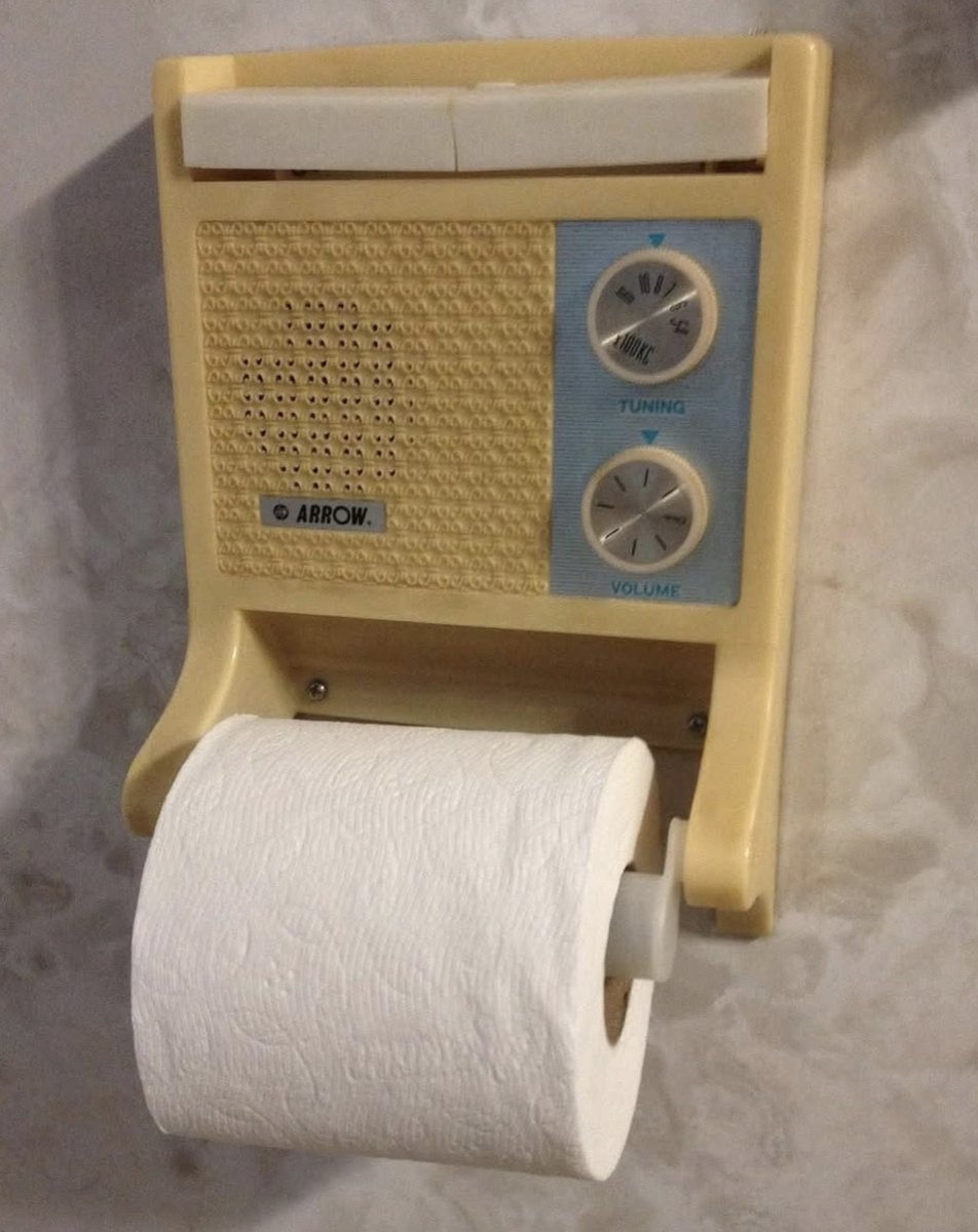 timecaptales's tweet image. Vintage toilet paper holder with a built-in AM radio from the 70s.