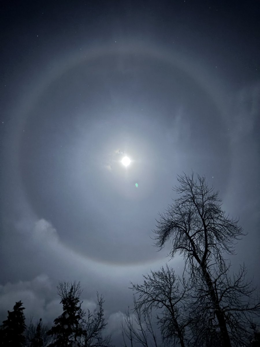 team5672's tweet photo. Dbik Giizis   Rings around the moon. Lunar halos. And check out the 4 directions power lines. Miigwech. #MnidooMnis #biboon https://t.co/Y5DDE1x1ba