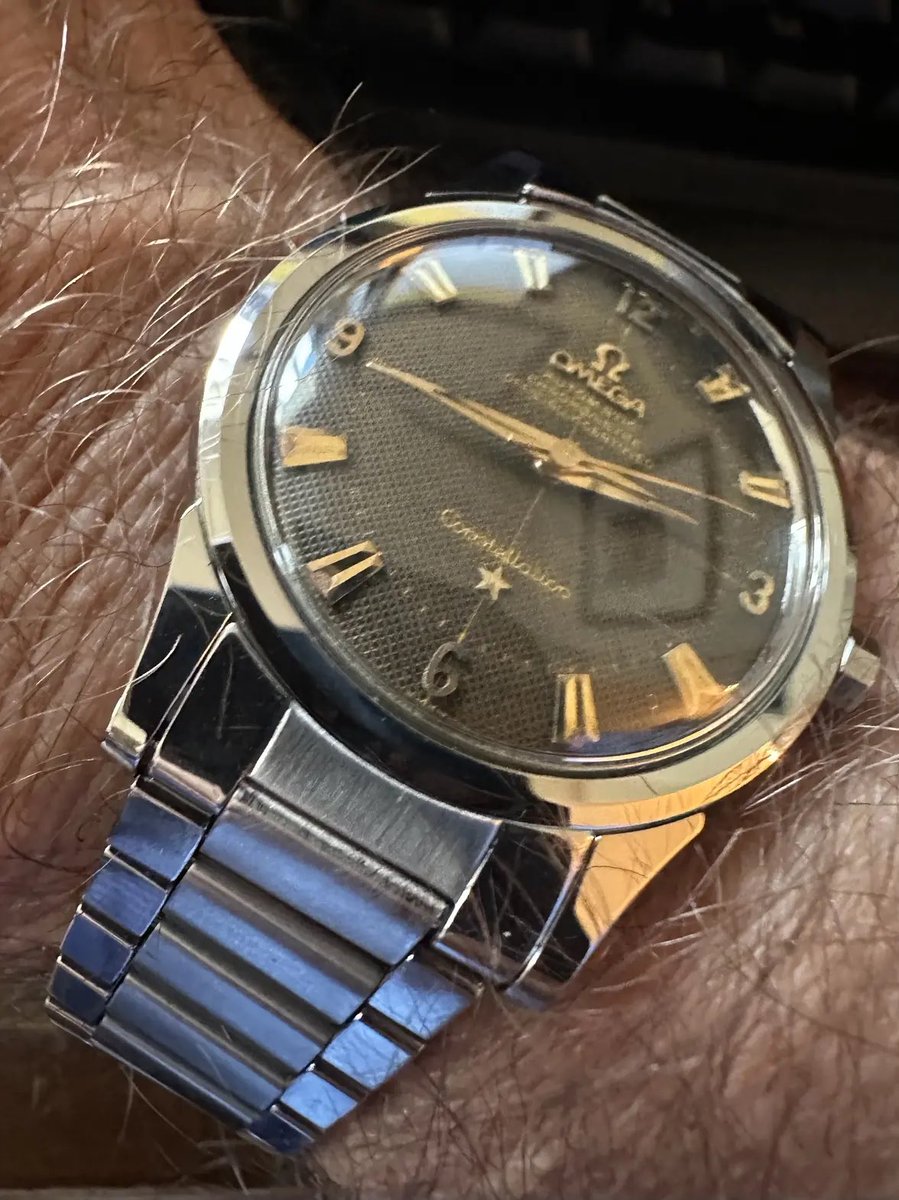 omegaforums's tweet photo. An Epic #Omega #Vintage #Constellation Ref 2887 Black Gilt Textured Dial with gold hardware in razor sharp stainless steel case, with flat link 1035 bracelet by #Omegaforums member gbesq, simply one of the best 50s Omega Dress watches 
https://t.co/C7UJ0L4xEw https://t.co/WmoHIJXFg9