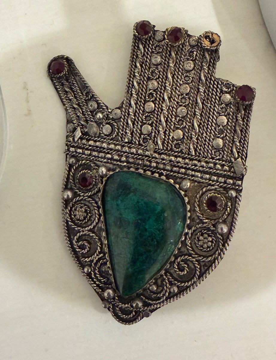This belonged to my late mother in law. I think it’s a Hamsa. It has Hebrew on the back and I believe she bought it in Israel, but I’ve never seen a Hamas like this. Anyone know anything about this type of Hamsa.