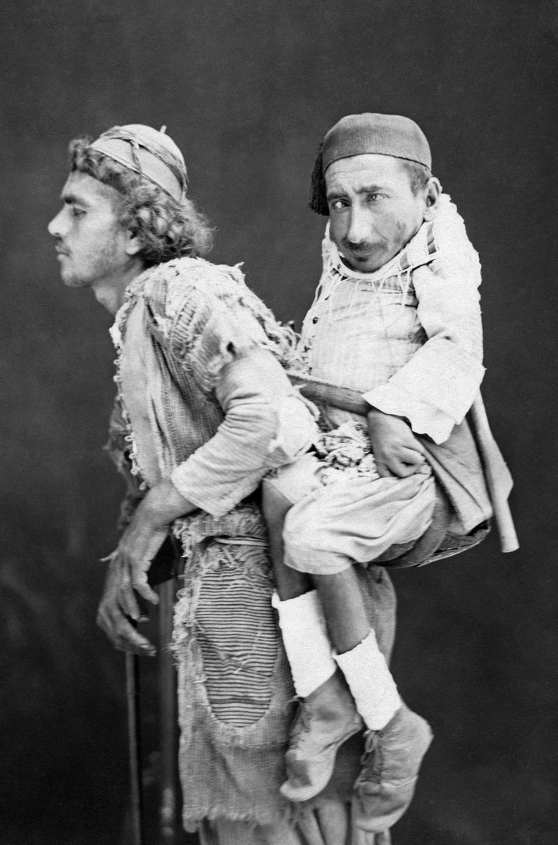 menavisualss's tweet image. ✝️☪️ This photo was taken in Damascus in 1899. 

The dwarf is Samir. He is a Christian and cannot walk. The one who carries him on his back is Muhammad. He is a Muslim and he is blind.

Muhammad relies on Samir to tell him where to go, and Samir uses his friend&apos;s back to navigate…