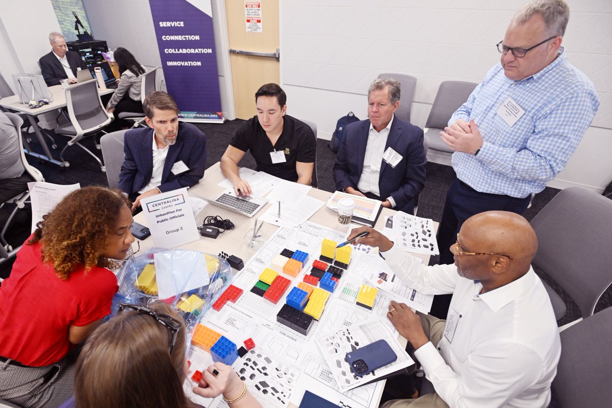 WeAreCentralina's tweet photo. Participants at Centralina Learns: UrbanPlan for Public Officials worked together to respond to a challenging redevelopment RFP, then presented their proposals in a mock public hearing. The experience showcased the delicate balance of community needs... https://t.co/85VCS5oewd https://t.co/ffzZdKDRdW