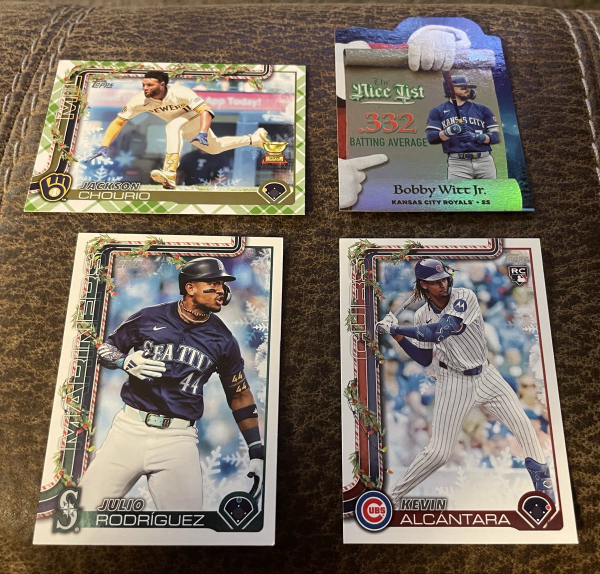 FlintRoger's tweet image. My Granddaughter surprised me with a Topps Holiday Advent calendar and told me promise I wouldn’t rip em all! Lol! So I promised and here is the 1st pack.Not a ton of value but a fun product! @CardPurchaser