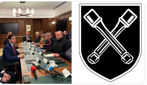 I dont understand why the US deligation will be at a table with the deligation of Ukraine where the Ukrainians wear Nazi symbols..? (German ww2 sharft handgrenades)
