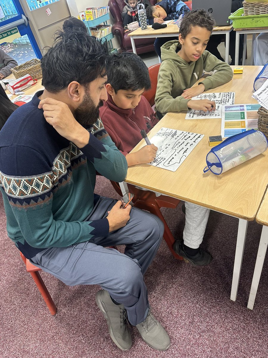 StMarysMossSide's tweet image. Parents joined us to see a maths lesson and explore fractions, and place value with Mr Rahman - creating visuals, simplifying fractions and spotting equivalents. It was fantastic to see everyone getting stuck in and supporting maths learning at home! ➗