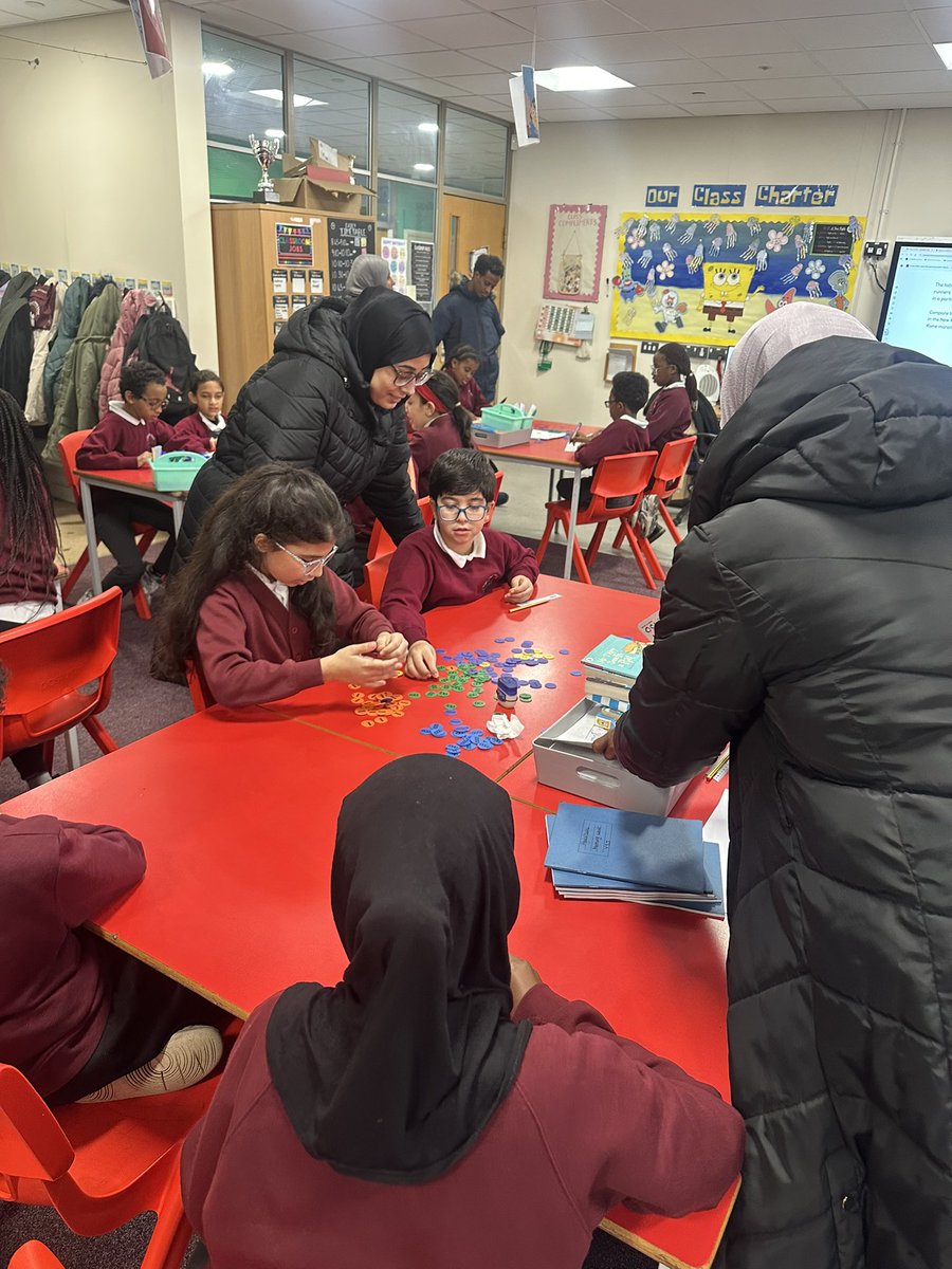 StMarysMossSide's tweet image. Parents joined us to see a maths lesson and explore fractions, and place value with Mr Rahman - creating visuals, simplifying fractions and spotting equivalents. It was fantastic to see everyone getting stuck in and supporting maths learning at home! ➗