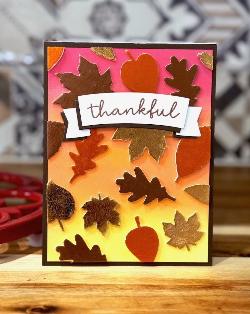 Thankful for YOU! 💖 We are loving Jennifer Ingle's beautiful Foiled Leaves 🍁 Thankful Card - full of dimension + shine! With the 𝘞𝘦𝘢𝘳 𝘠𝘰𝘶𝘳 𝘈𝘥𝘩𝘦𝘴𝘪𝘷𝘦 𝘰𝘯 𝘵𝘩𝘦 𝘖𝘶𝘵𝘴𝘪𝘥𝘦 technique, you can recreate this too! No special tools 👉 buff.ly/onE0Laj