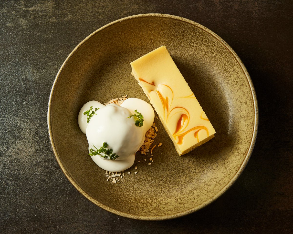 Craving something sweet? 🍰🥭 Indulge in our Mango Cheese Cake with a twist of passion fruit sorbet and toasted coconut flakes. It's the talk of the town for a reason! #TheFranklinRoom #MangoLove #CheeseCakeCraze