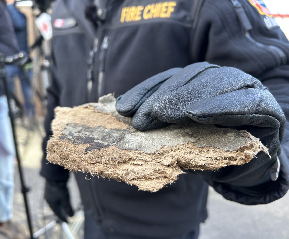 tonyfera1's tweet image. The fire at 11 Thorncliffe Park &amp;amp; 21 Overlea is a logistical challenge.  The buildings are attached and there is a membrane or liner between the two.  
Fire Chief Jessop shows a piece of that liner that’s slowly burning.  Fire fighters lack access to the tight space to put it out