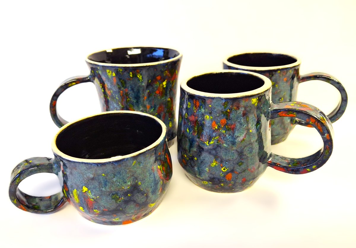 A very seasonal kiln unloading this morning. Christmas trees and Santas ready for display and lots of mugs, a favourite Christmas present to purchase. In the midst of it all, Bradley Merritt's Orca Platter is just stunning., his latest work in his whale series.