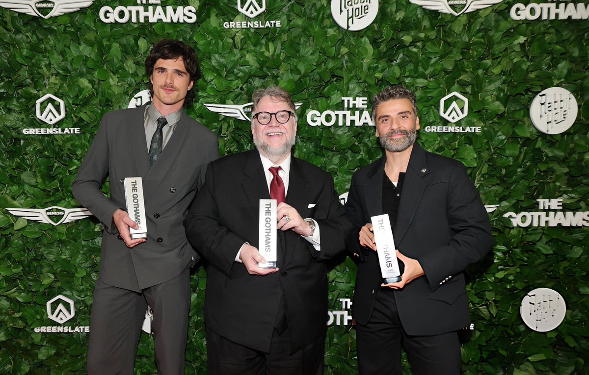Oscar Isaac, Guillermo del Toro and Jacob Elordi with their Vanguard Tribute Award at the Gotham Film Awards.