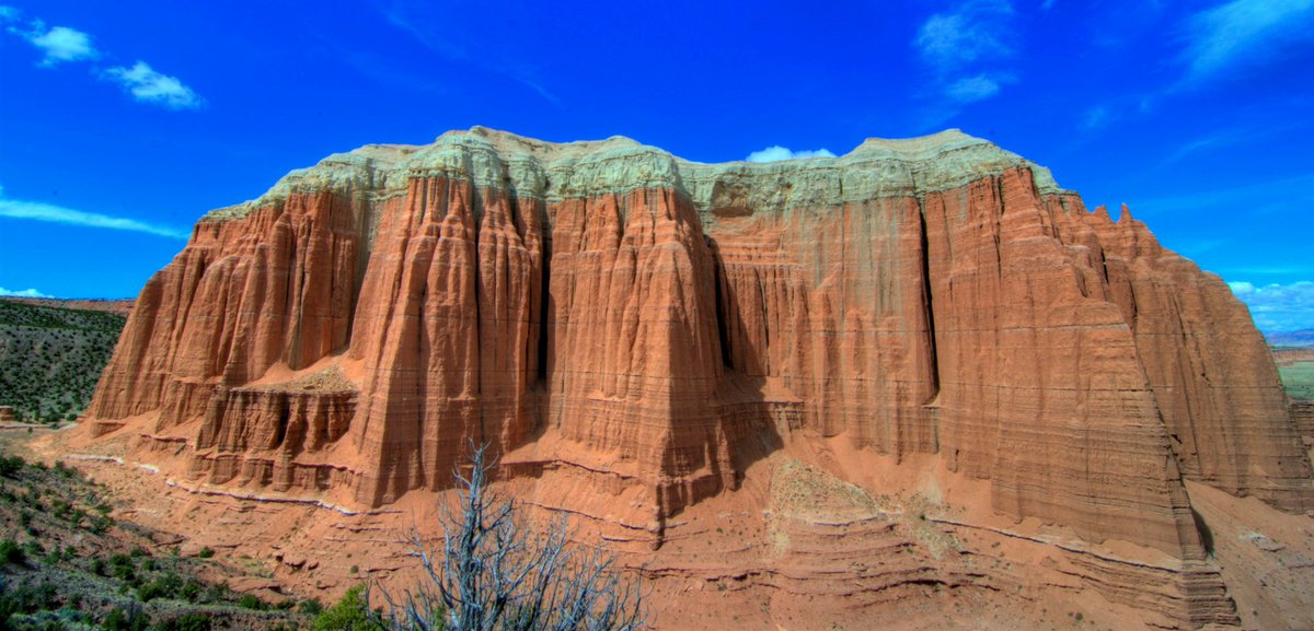 geologyBits's tweet photo. π₯ βοΈ Capitol Reef National Park
nestled in south-central Utah's Colorado Plateau, spans 377 square miles and showcases a dramatic 100-mile-long geologic wrinkle known as the Waterpocket Fold.
β€οΈ π #CapitolReef #WaterpocketFold
π @carew97
βΆοΈ A classic monocline where ancient sedimentary layers tilt steeply on one side while remaining nearly flat on the other.
This exposed stack of rocks, nearly 10,000 feet thick, reveals over 250 million years of Earth's history, from Permian deserts to Jurassic seas and Cretaceous river deltas, painted in vibrant reds, whites, yellows, and pinks from iron oxides and other minerals.
βοΈ The park's geology began in the Permian Period around 270 million years ago, when vast Saharan-like dunes buried the region under windblown sands, forming the white, cliff-forming Kaibab Limestone after marine waters later flooded the area, depositing fossils like brachiopods and crinoids.
βοΈ An erosional gap followed before the Triassic Moenkopi Formation (about 245 million years ago) layered on brown siltstones from ancient mudflats and rivers, topped by the colorful, bentonite-rich Chinle Formation shales that hold petrified wood and early dinosaur tracks.
βοΈ By the Late Triassic, the massive red Wingate Sandstone dunes, similar to today's Simpson Desert, built towering cliffs, while the Early Jurassic Kayenta Formation added river sands and muds.
βοΈ The Middle Jurassic brought tidal flats and shallow seas that deposited the reddish Entrada Sandstone, whose jointed layers erode into the park's iconic cathedrals, monoliths, and goblins in Cathedral Valley, echoing features in nearby Arches and Goblin Valley parks. Above it, the Curtis Formation's limy sands and shales form protective caps.
βοΈ The highlight is the Early Jurassic Navajo Sandstone, a 2,000-foot-thick cross-bedded behemoth of ancient desert dunes that creates rounded white domes like Capitol Dome (inspiring the park's name alongside the "reef-like" barrier of cliffs) and curvilinear canyons such as those at Navajo Knob. Later, the Late Jurassic Morrison Formation dumped river gravels and muds rich in dinosaur bones, while Cretaceous rocks like the Straight Cliffs Formation added coal swamps and oyster reefs.
βοΈ The Waterpocket Fold itself formed 50β70 million years ago during the Laramide Orogeny, when compression from the rising Rockies reactivated a buried fault, buckling the overlying sediments into this steep east-facing escarpment that traps "water pockets" in its potholes. Erosion then sculpted the landscape: wind and flash floods widened canyons, carved arches, and exposed the tilted strata.
Volcanic activity 20β30 million years ago capped nearby mountains with basalt, and Ice Age glaciers within the last 150,000 years plucked black boulders from those heights, depositing them via floods and landslides across the park's valleys.
Today, ongoing erosion reveals strike valleys, dikes, gypsum domes, and colorful bentonite hills, making Capitol Reef a living textbook of plateau geology.