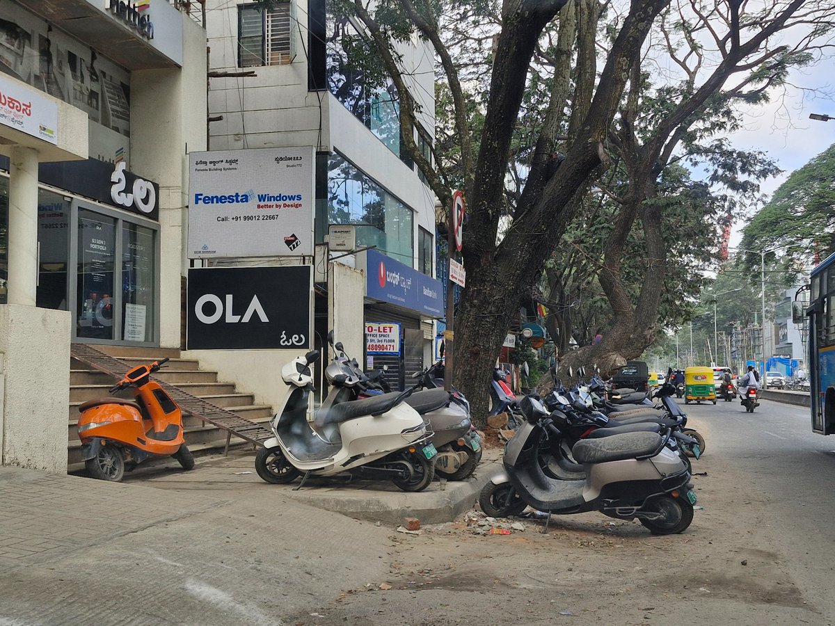 Junkyard of <a href="/OlaElectric/">Ola Electric</a> , 80ft road koramangala, near big bean caffe/cult fit. <a href="/adugoditrfps/">ADUGODI TRAFFIC BTP</a> <a href="/adugodips/">Adugodi Police Station ಆಡುಗೊಡಿ ಪೊಲೀಸ್ ಠಾಣೆ.</a> <a href="/kmangalaps/">Koramangala Police Station</a> <a href="/VOfKoramangala/">Voice of Koramangala</a> <a href="/KoramangalaRWA/">I Am Koramangala</a> . <a href="/bhash/">Bhavish Aggarwal</a> thanks for road encroachment <a href="/osd_cmkarnataka/">Office of the OSD to CM Karnataka</a> <a href="/TVMohandasPai/">Mohandas Pai</a> <a href="/kiran/">Kiran Divvela</a>
