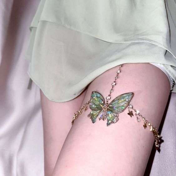 aesttics's tweet image. butterfly thigh chain