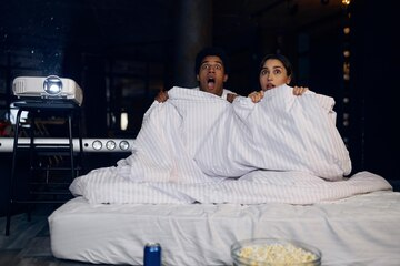 A man escapes from a prison where he’s been locked up for 15 years.💔

He breaks into a house and inside, he finds a young couple in bed.
He ties him to a chair. 

While tying the wife to the bed, the convict gets on top of her, kisses her neck, then gets up and goes into the