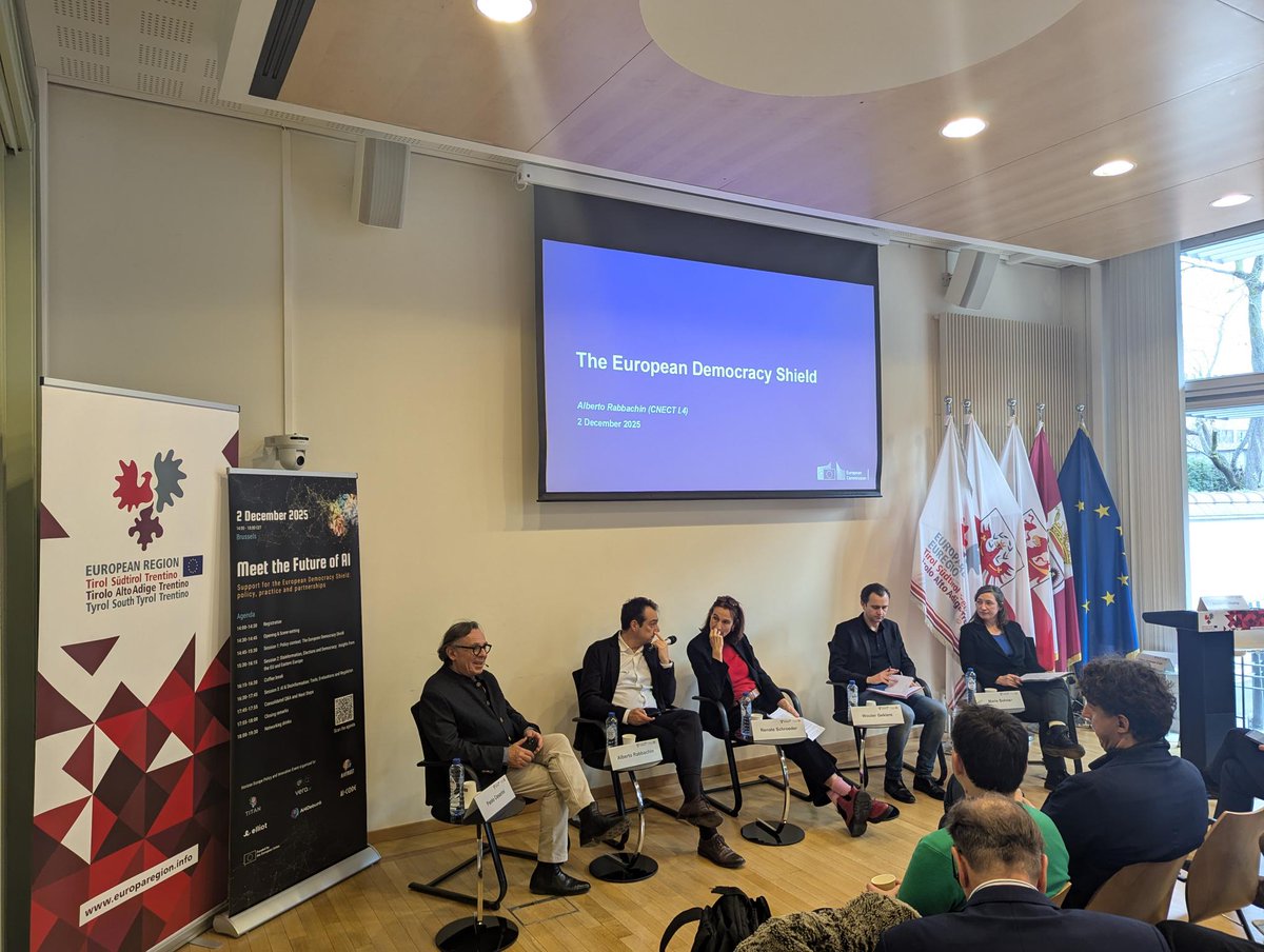 Euractiv's tweet photo. 🔵 Session 1 is underway. We are looking at the policy context behind the European Democracy Shield and how EU institutions are working to protect democratic processes in the age of AI. Themes include resilience, coordination and information integrity. #MeetTheFutureOfAI https://t.co/JV486Fj9Rm