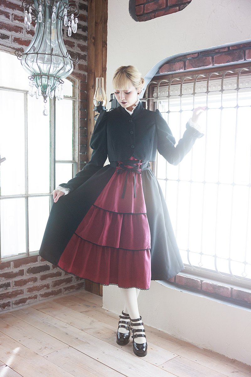 スカート・ジブレ入荷】 前後にあしらったフリルが印象的なロング