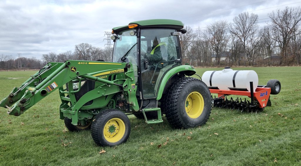 Duaine running the aerator on Civic Park soccer fields yesterday before today's snowfall.  Pulling 2"-3" cores with no additional ballast.