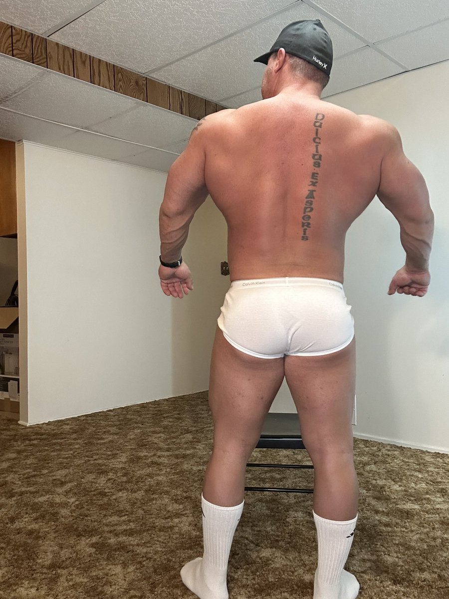 Coach Dred strips down to his briefs before a shower