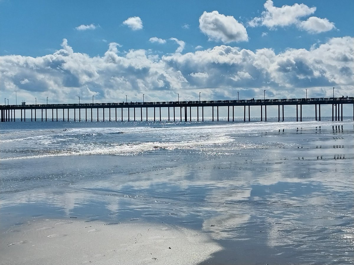Cloud train on a railroad track.