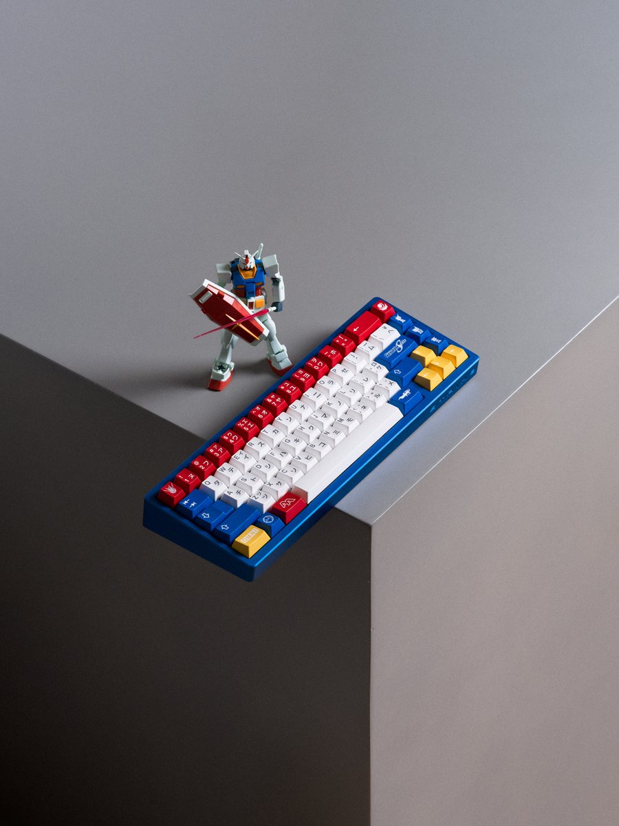 An Officially Licensed Gundam SEED keyboard.

It's called the Gundamhaku and was designed by SingaKBD and it's paired with matching GMK keycaps.

Amazing.