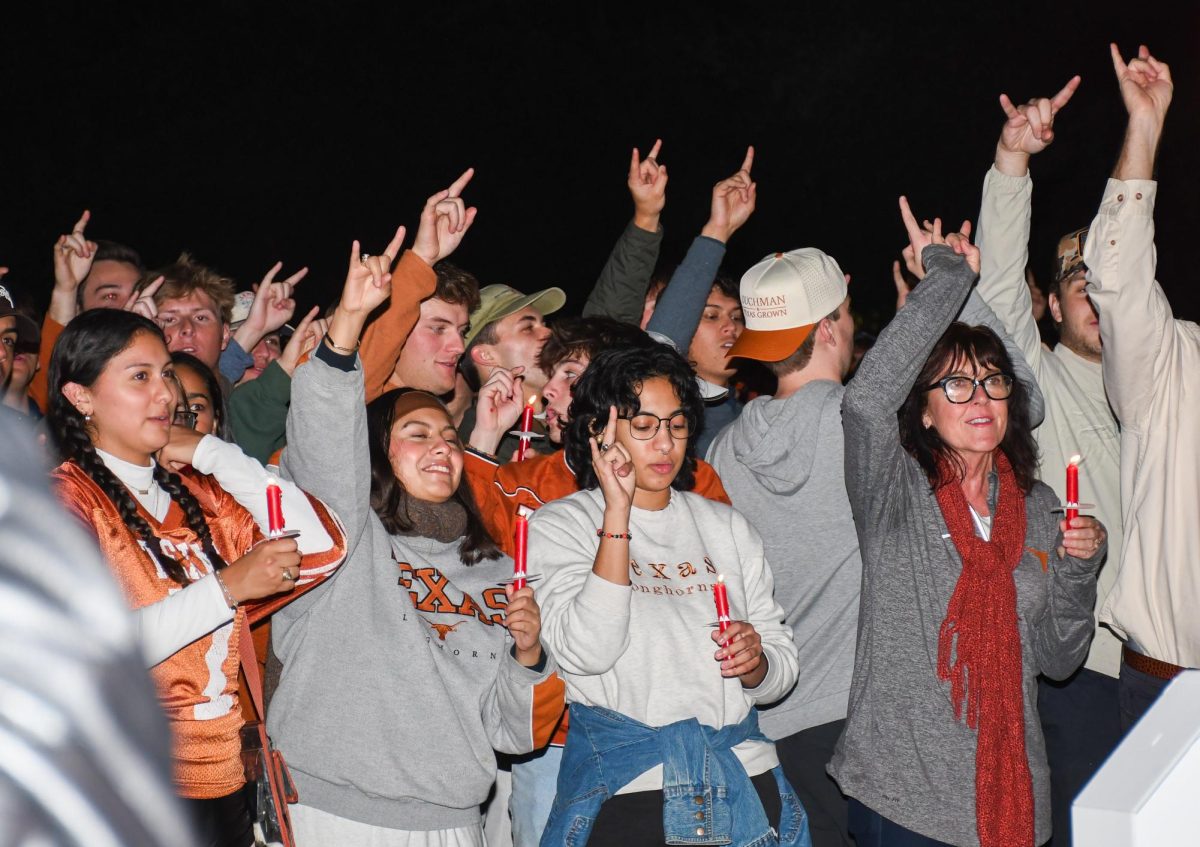 thedailytexan's tweet photo. Students, faculty and alumni gathered at the @UTAustin Tower late Thursday night for a revival of the Hex Rally, a Texas tradition to hex @AggieFootball ahead of the Lone Star Showdown. The late night event, led by student organizer Morgan Hernandez, featured both old rituals and new elements, uniting the UT community in spirit and superstition for the first time since 2011.

https://t.co/0BOBCfbOHe