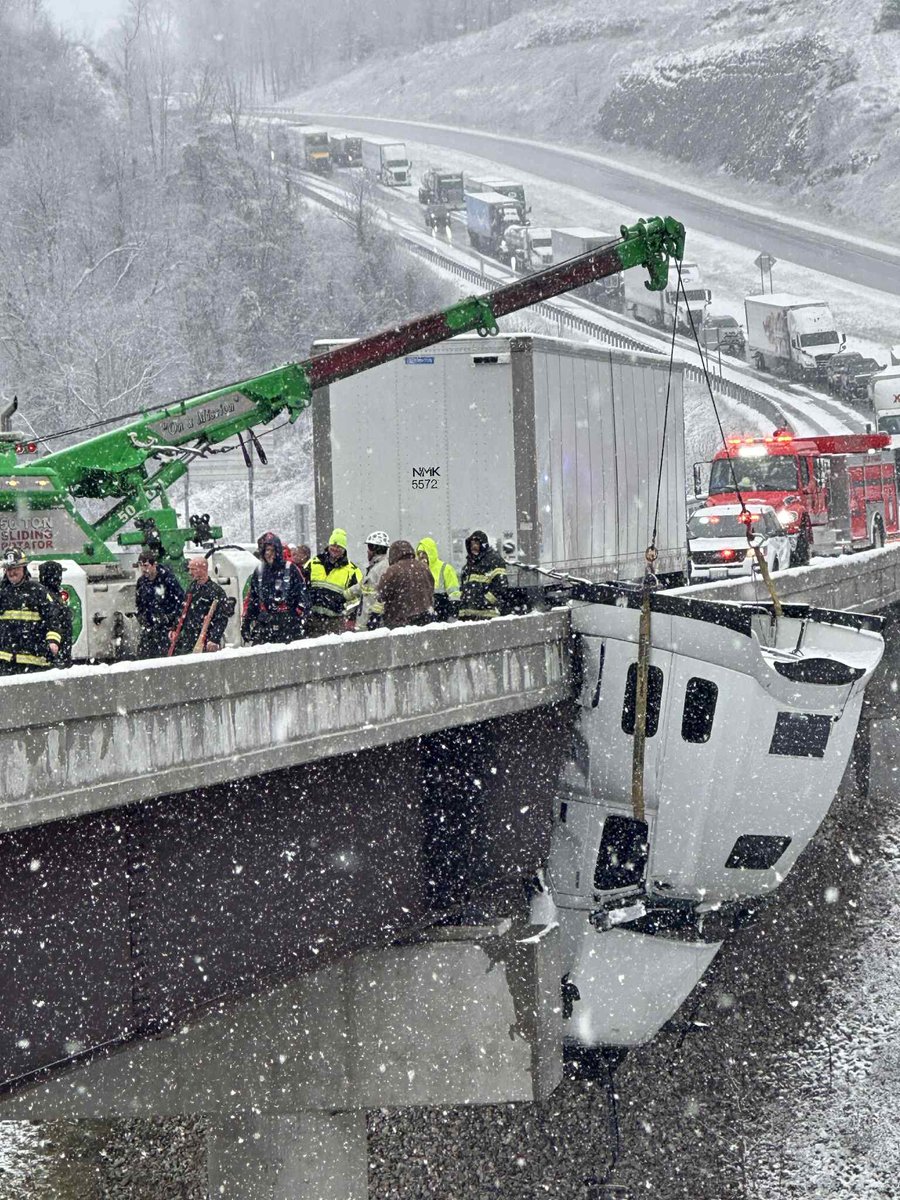 AnthonyWCHS's tweet photo. Here’s some incredible photos of today’s rescue along Rt 35 in Mason County. Crews used ropes to rescue the driver while his cab dangled over a bridge at Sixteen Mile Rd. The driver was stuck in there for five hours, but refused medical treatment. 
📸: St Albans FD &amp; Vickie Flora https://t.co/AmkjAou2GR