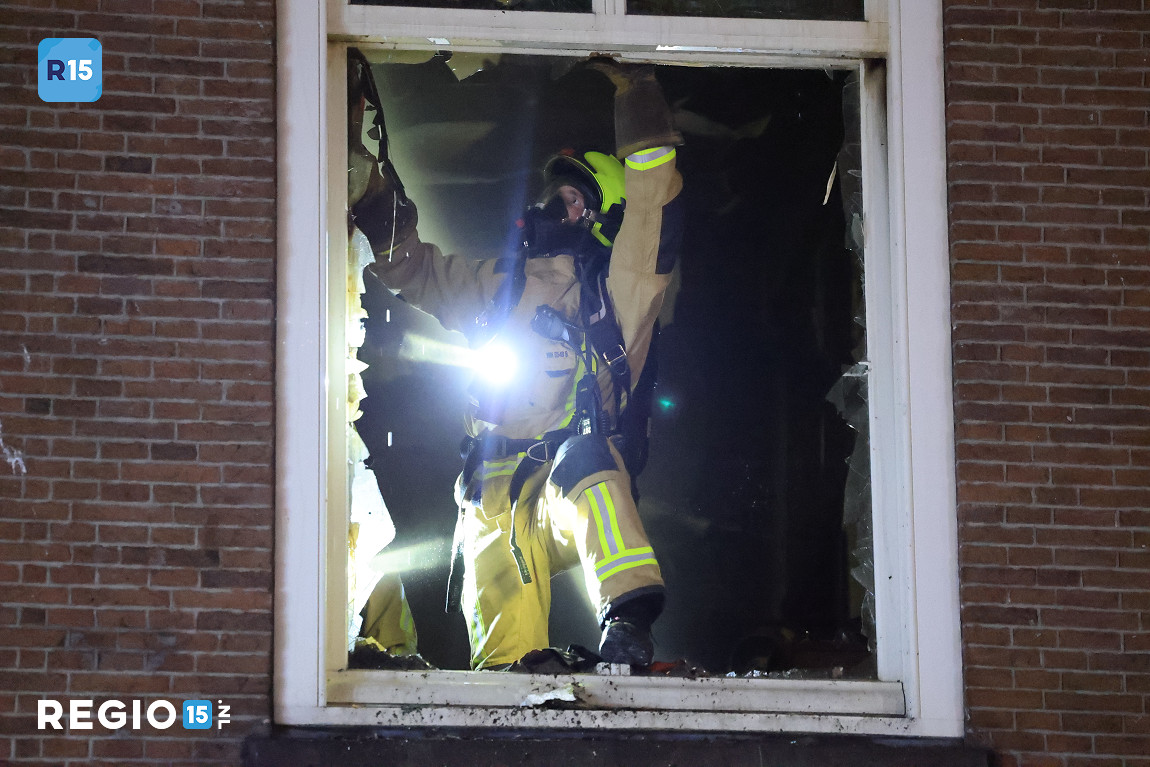 Felle brand in woning aan de GedempteBurgwal in Den Haag