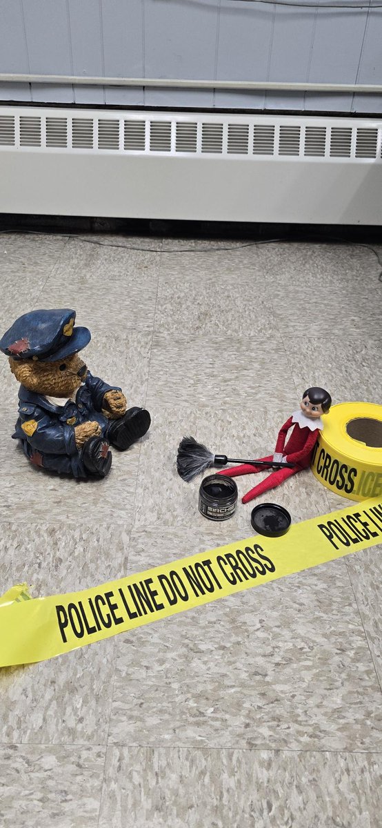 The Elf has landed at the 7th District and is already hard at work learning how to process crime scenes!                  Be sure to follow and check in everyday to see his next adventure