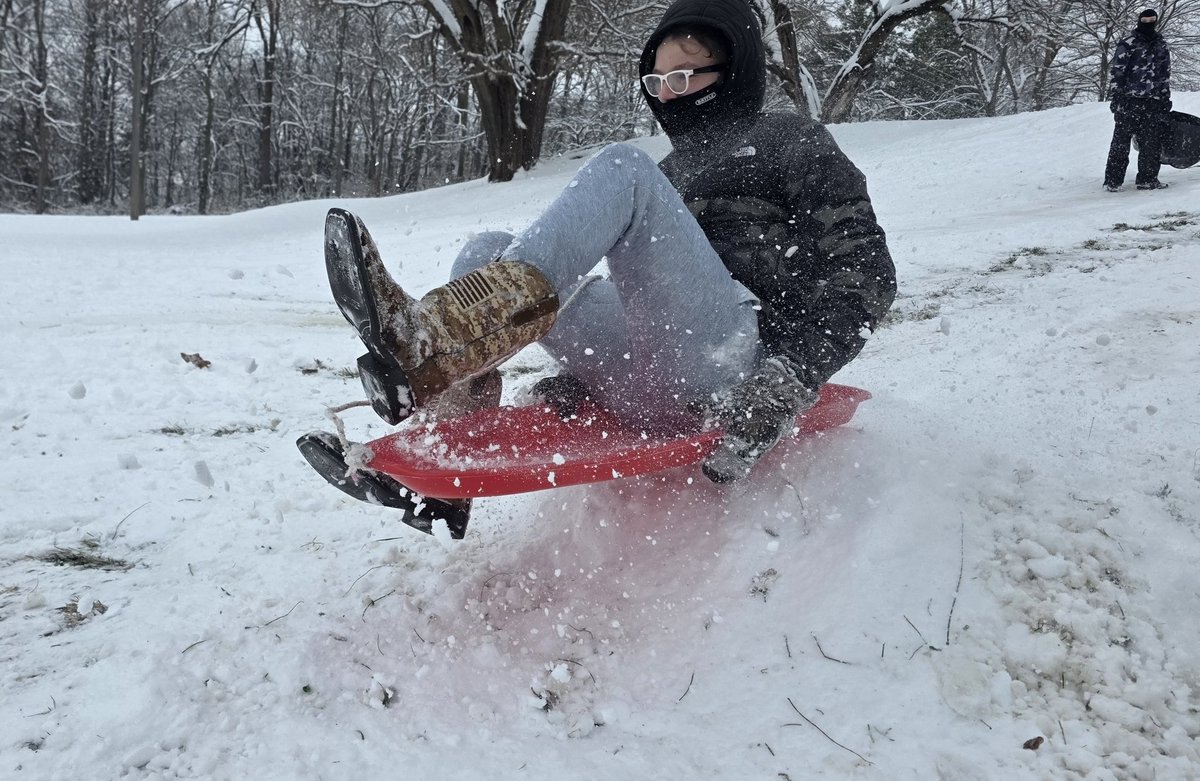 Knightstown Jr. High students enjoying the powder at Sunset Park! Don't forget your Elearning work. 🐾🛷❄️