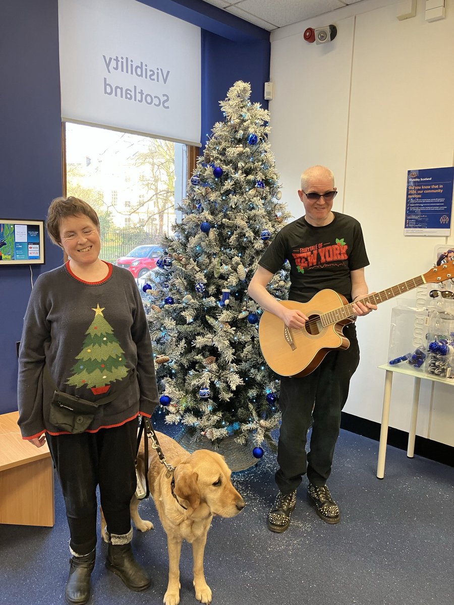 2 blindies, 1 Xmas tree guide dog and guitar for an unscripted performance in Visibility Scotland’s reception.