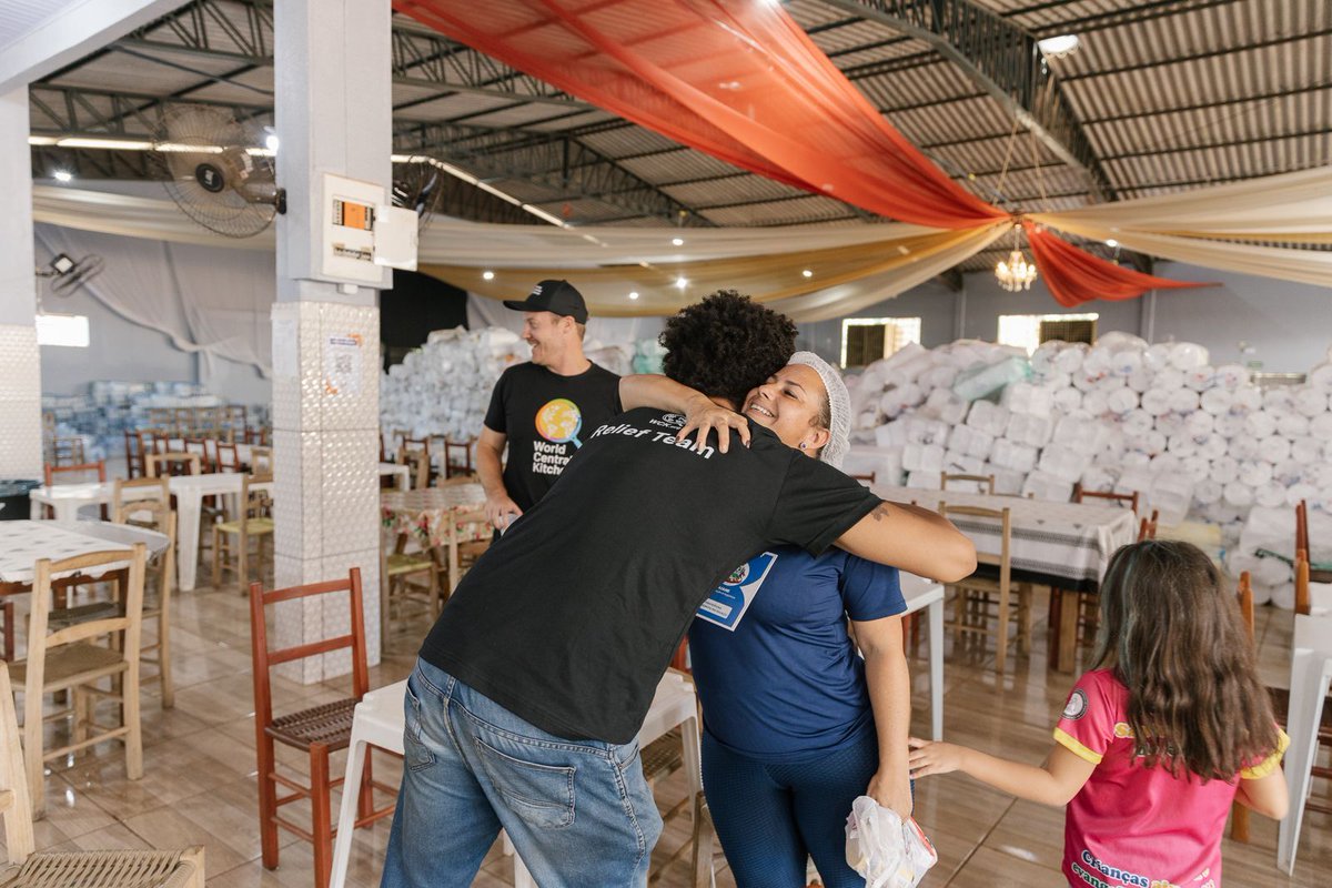 WCKitchen's tweet image. WCK teams met Daiane at the Centro de Idosos, one of the few large buildings in Rio Bonito do Iguaçu that survived the tornado. She has been working here nonstop to coordinate volunteers and donations for impacted residents. Our #ChefsForBrazil teams provided hot meals that…