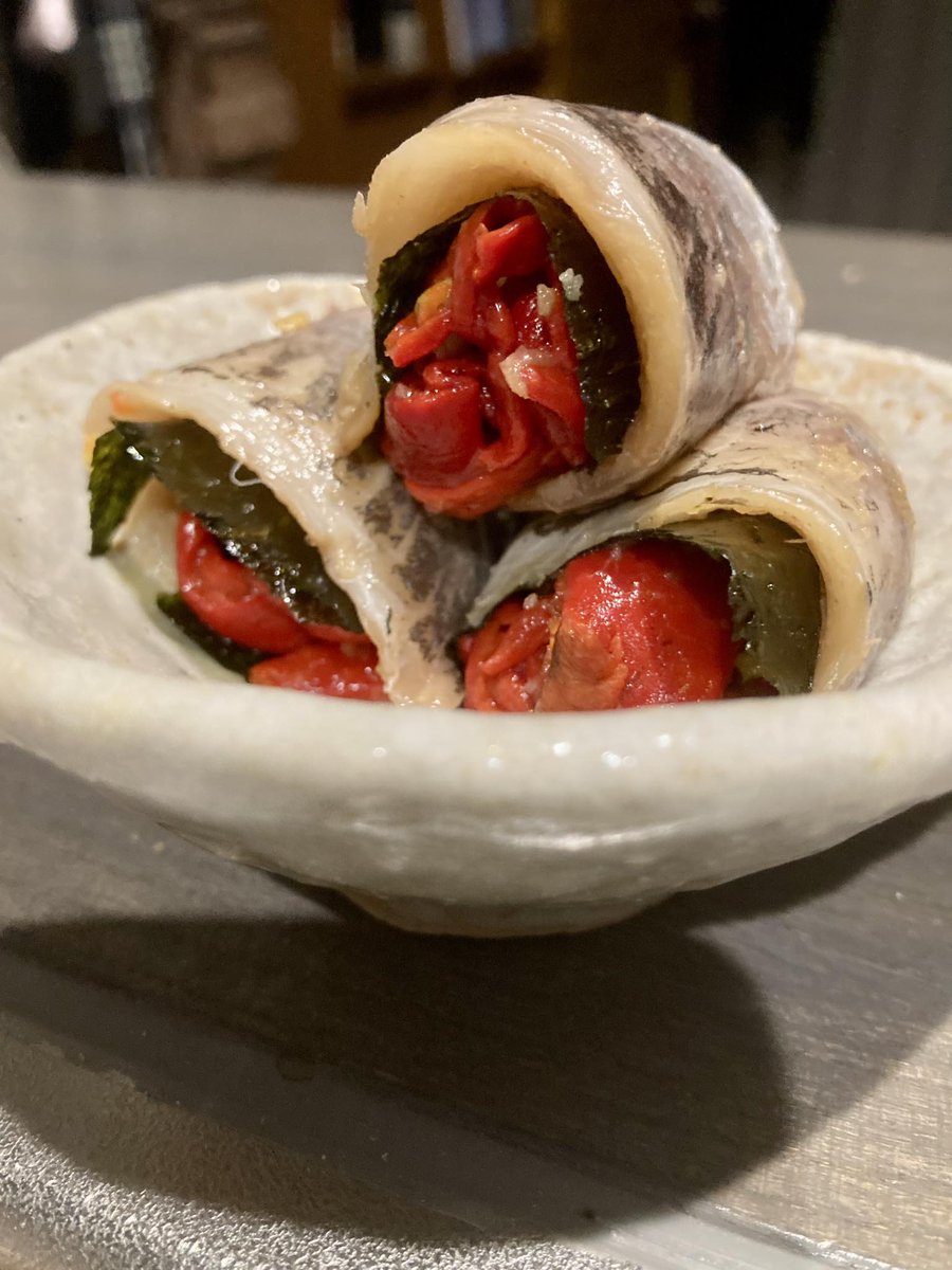 Today’s  sashimi supper is raw Aji (鯵, horse mackerel) fillets wrapped around  Korean-style nori and roasted red bell pepper. Seasoned with freshly  grated garlic, chopped pickled ginger, soy sauce, and olive oil. #mysashimilife #eatingwell