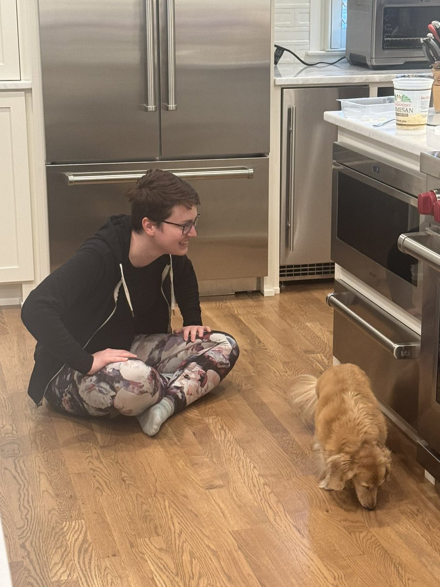 Lydia discovered my microwave opened automatically like a shelf and was enamored