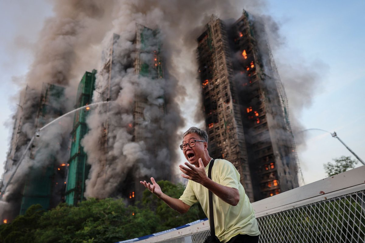 At one point, Wong’s wife called Wong after the fire broke out and had a short conversation that lasted about a minute, their son said, declining to give details. “Soon after that chat, she disappeared.”

The photo that became a symbol for Hong Kong's deadly fire.