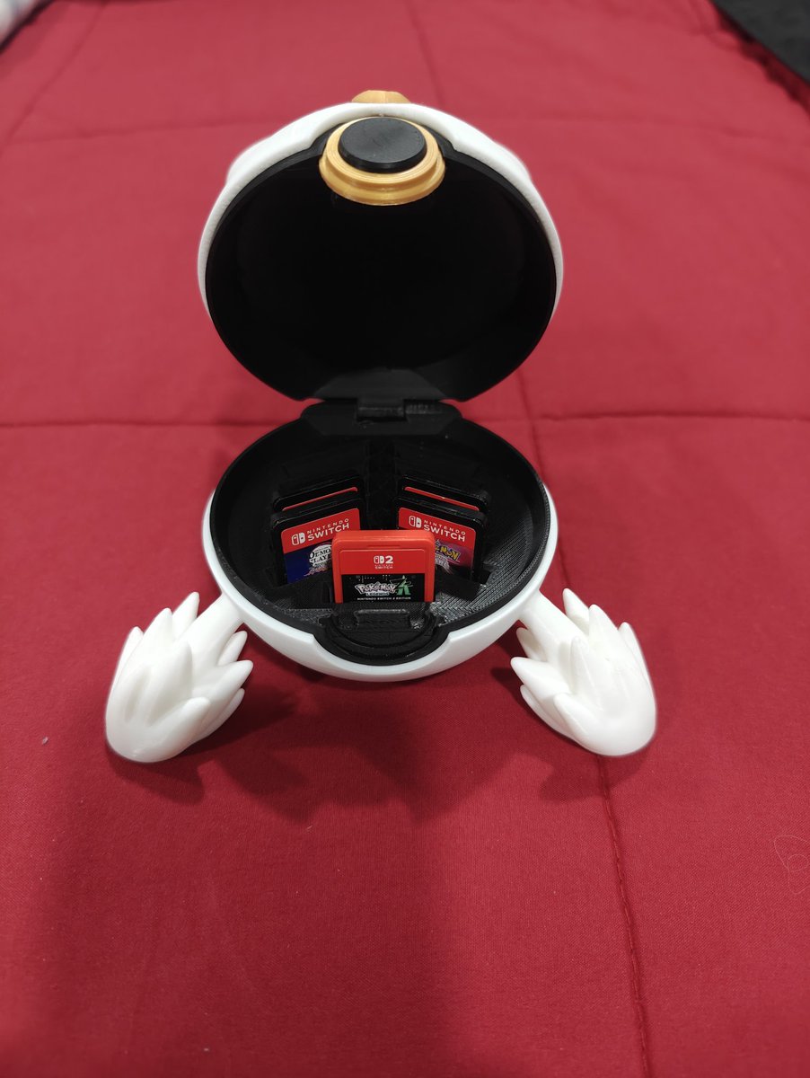 NargDev's tweet photo. Check out this mega gengar PokeBall holder for switch games that I printed 😍😍 @poshqueenn https://t.co/wF9eCgPMJh