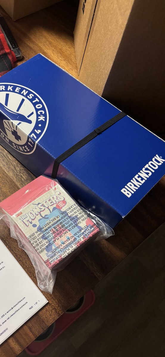 lafettig's tweet photo. Yesterday I was expecting cabinet handles from Anthropologie but instead received a Labubu &amp; Birkenstocks from Urban Outfitters. Addressed to me from Anthro on the box, inside shipping info was to someone in a different state (ordered through UO). 

The birks are my size 😳 https://t.co/vyyH2Jyf2f