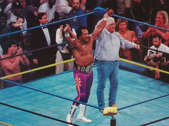 allan_cheapshot's tweet image. Dusty Rhodes raises the hand of the new WCW Worlds Heavyweight Champion, Ron Simmons in 1992.