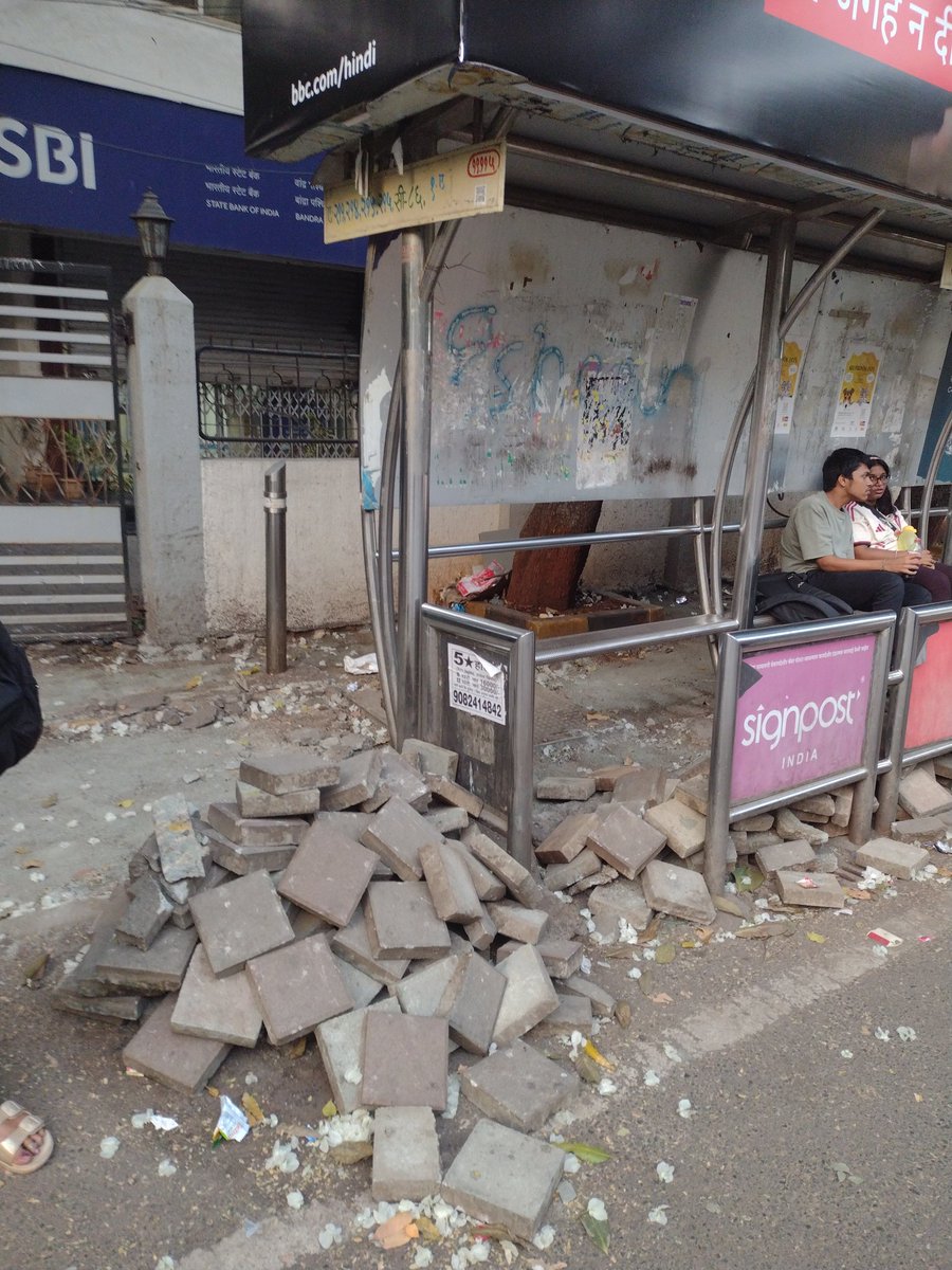SmartlyGaming's tweet photo. @mybmc has dug up the footpath near Holy Family Hospital Bus Stop (Bandra West) and left the stones next to and under the bus shelter
@myBESTBus pls take action https://t.co/cWFKbjbFLL